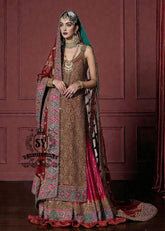 Immerse yourself in the timeless brilliance of a Pakistani couture bridal lehenga. Vibrant traditional hues of red are lightly interwoven with shimmering gold, enveloping the bride in an aura of glamour and grace.