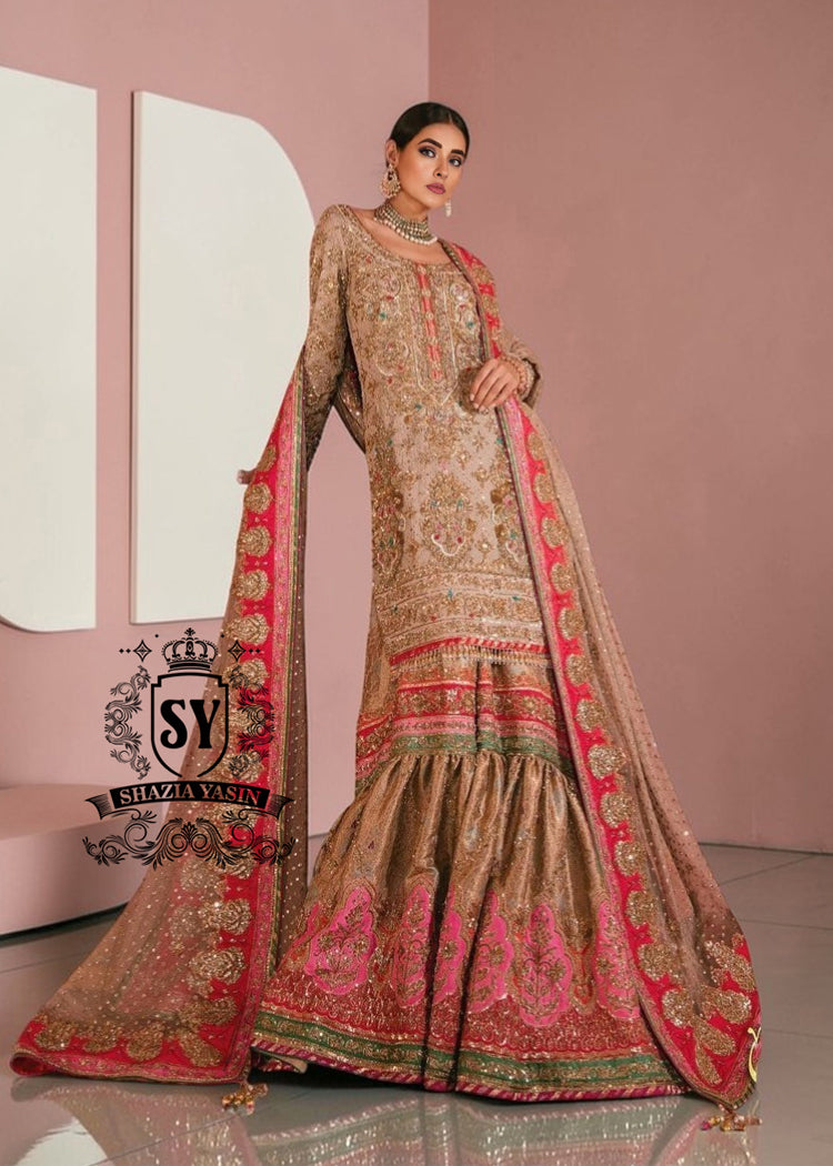 This luxurious, exclusive wedding dress from leading Pakistani designers shimmers with a noble glow in the light. Its majestic Gharara silhouette is perfect for a triumphant entrance, captivating the senses. This look exudes the hand of a true master who understands the value of true beauty.