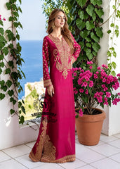 Truly stunning. This Big dip o’ruby raw silk Kaftan is perfect for evening occasions. Delicate Marori embroidery by skilled artisans adorns the sleeves and hem, creating a classic feel. For any celebration this season.