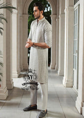 This exquisite kurta embodies sophisticated elegance and timeless grace. Crafted from the finest premium fabrics and meticulously designed with intricate embellishments and delicate sequin work, it exudes understated luxury.