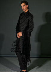 This edgy Sherwani masterpiece from Shazia Yasin is just right for the modern groom, Who wants to make a statement. A Sherwani design that blends classic softness with royal presence.