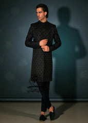 This edgy Sherwani masterpiece from Shazia Yasin is just right for the modern groom, Who wants to make a statement. A Sherwani design that blends classic softness with royal presence.
