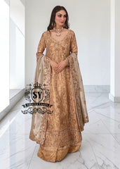 Our radiant Bride shining in the elegant angrakha pishwan, crafted from luxurious silky lame and adorned with exquisite embellishments. Let this gold outfit accentuate your captivating beauty!