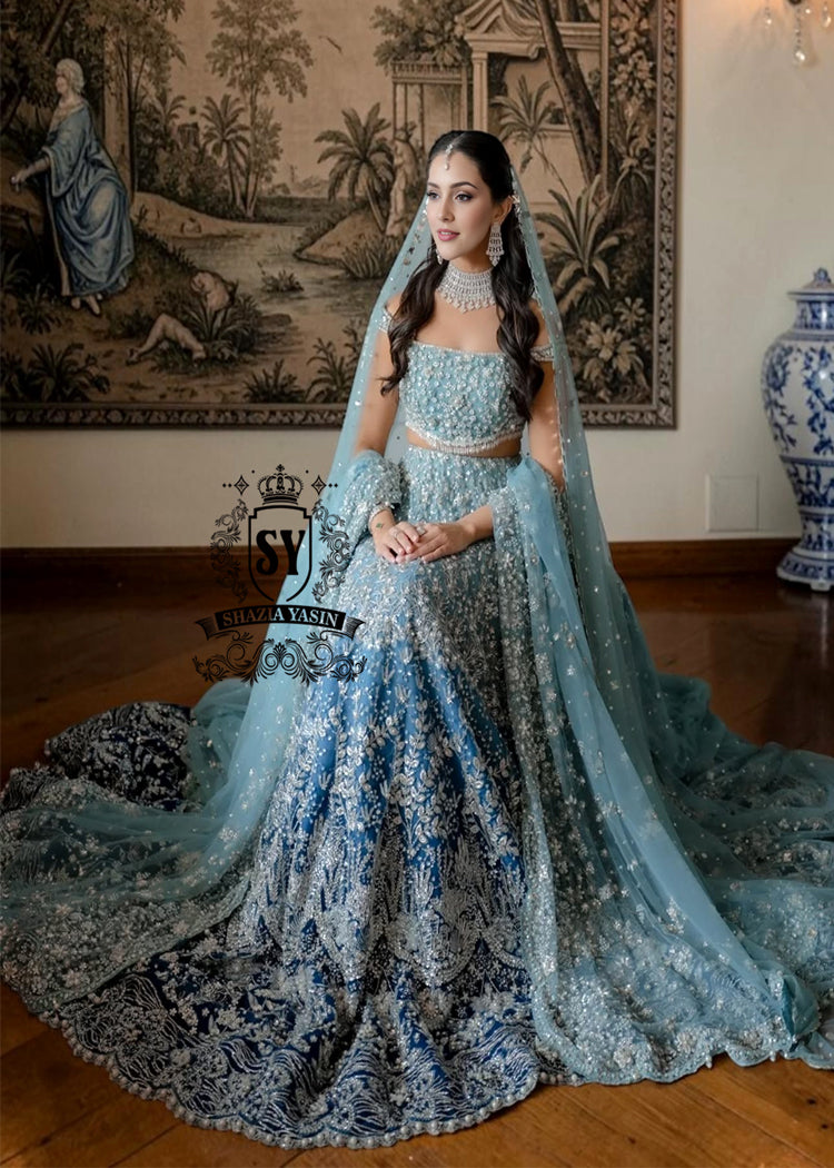 Feel like a queen in this spectacular wedding dress! Every detail, from the shimmering sequins to the delicate embellishments on the Lehenga Choli, is designed for an unforgettable entrance. 