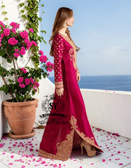 Truly stunning. This Big dip o’ruby raw silk Kaftan is perfect for evening occasions. Delicate Marori embroidery by skilled artisans adorns the sleeves and hem, creating a classic feel. For any celebration this season.