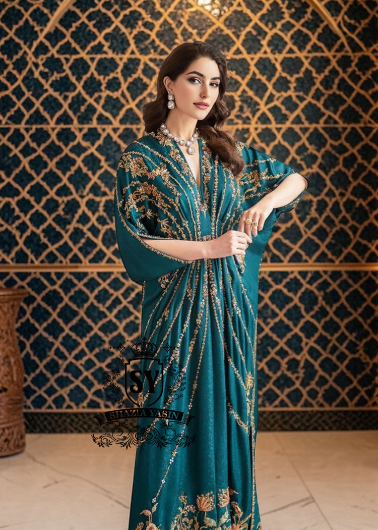 A full-length yet sensual colored Kaftan gown with trendy gathers, could have been the perfect wedding guest—The Kaftan dress, with its X-shaped draping, It has the same character: it will look luxurious both on the red carpet and at the wedding reception.