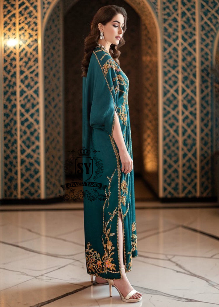 A full-length yet sensual colored Kaftan gown with trendy gathers, could have been the perfect wedding guest—The Kaftan dress, with its X-shaped draping, It has the same character: it will look luxurious both on the red carpet and at the wedding reception.