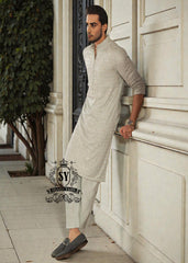 This exquisite kurta embodies sophisticated elegance and timeless grace. Crafted from the finest premium fabrics and meticulously designed with intricate embellishments and delicate sequin work, it exudes understated luxury.