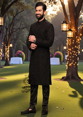 A sophisticated Black classic sherwani, and beautifully executed with intricate hand embroidery featuring sequins and beads. It is designed for versatility.