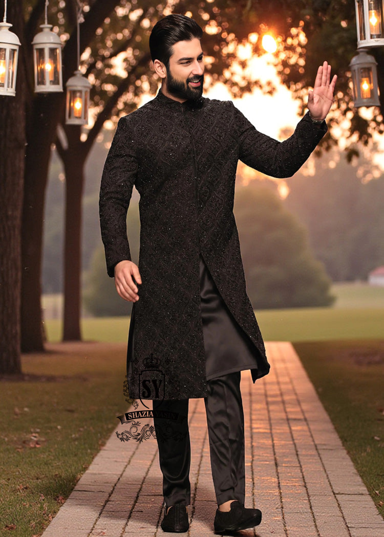 A sophisticated Black classic sherwani, and beautifully executed with intricate hand embroidery featuring sequins and beads. It is designed for versatility.