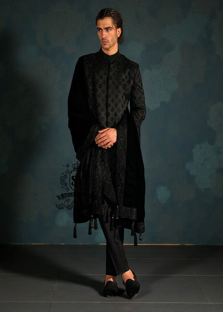 This edgy Sherwani masterpiece from Shazia Yasin is just right for the modern groom, Who wants to make a statement. A Sherwani design that blends classic softness with royal presence.