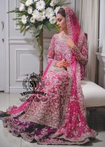 A dream wedding dress, designed to enhance the beauty and elegance of the wearer. This exquisite long shirt silhouette perfectly blends A-line Lehenga style with a touch of sophistication.