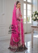 A dream wedding dress, designed to enhance the beauty and elegance of the wearer. This exquisite long shirt silhouette perfectly blends A-line Lehenga style with a touch of sophistication.