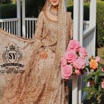 This incredibly romantic bridal dress will make any bride feel like a fairy tale heroine on her wedding day. Striking contrast with the voluminous farshi lehenga skirt.