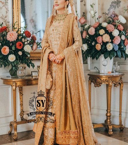 An embellished bridal dress with royal silhouette farshi Lehenga, embodying the perfect blend of classic sophistication and ethereal romance. The Crystal embroidery asserts itself, scattered in places, dense in others, evoking radiant brilliance throughout.