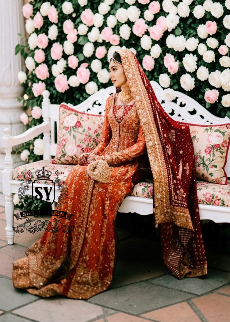 BridalDress198A A traditional Pakistani bride epitomizes royal elegance in our newest bridal Pishwas Lehenga dress.