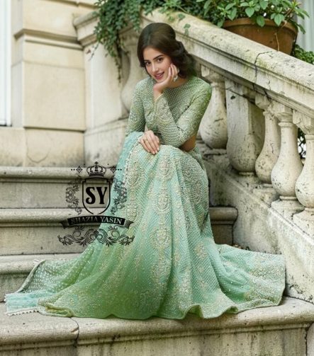 Experience the epitome of haute couture bridal fashion with Shazia Yasin's iconic Lehenga choli dresses, where soft Chiffon meets stunning silhouettes and unparalleled craftsmanship.