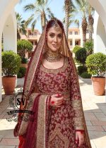 Flawless craftsmanship in the details meets a modern Anarkali silhouette. With its elegant Lehenga and captivating crystal embellishments, this is one of the most striking pieces from our collection.