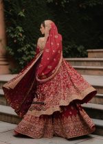 Discover our unique Bridal dress – the quintessence of elegance and luxury! Dreamlike Pishwas add grace, while the flowing sharara creates a spectacular effect when moving. Delicate embellishments complete the look, giving it a unique sparkle. Perfect for any special occasion where style and class go hand in hand.