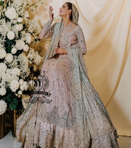 You can conquer the world! Exclusive Bridal dress style with perfect Lehenga lines. Underline your status with Fair Pink Wedding dress.