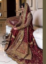A wedding dress with a long train lehenga embroidered with crystals, created for an unparalleled look for the bride. The delicate embellishments softly sparkles with every movement, while the wedding gown silhouette beautifully highlights her natural elegance.