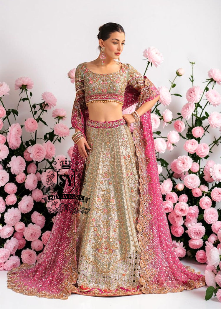 BridalDress226A This Bridal dress is the true embodiment of elegance: delicate, silky Lame envelops the Lehenga silhouette, emphasizing every movement. Rich decoration creates a radiant effect - exquisite embroidery with pearls, beads and crystals adds depth and noble shine.