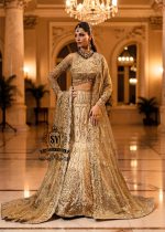 Ivy is a mermaid wedding dress that fascinates with the refinement of its lehenga silhouette, which delicately follows the lines of the body and highlights a timeless elegance. The blouse of the dress is outlined by a embellished neckline, while the long sleeves, made entirely of net with shiny floral embellishments, add an extra touch of sophistication.