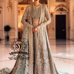 Fantastic Bridal dress in bright Crystal color will make your look extraordinary Original cut, luxurious embellishments, seductive Lehenga Choli style.