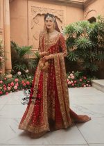 Radiating pure Amaranth Red bridal dress magic with two legged farshi lehenga. A perfect balance of grandeur and simplicity.