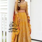 Envelop yourself in the magic of this Fluorescent Orange bridal dress is a perfect example of elegance and craftsmanship, designed for the bride who desires an unforgettable Mayon look.