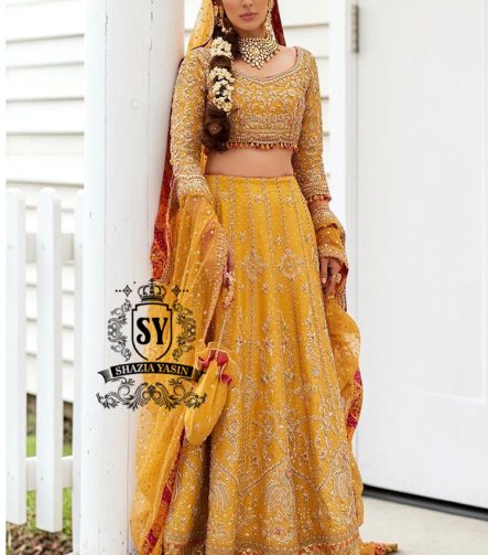 Envelop yourself in the magic of this Fluorescent Orange bridal dress is a perfect example of elegance and craftsmanship, designed for the bride who desires an unforgettable Mayon look.