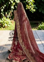 Obsessed with this sweetheart neckline glitter bridal dress. The cathedral train adds the perfect touch of elegance. The delicate shimmer and flattering lehenga silhouette make it a dream for any bride. Perfect for a romantic ceremony or a grand celebration.