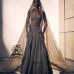 A luxurious bridal look, created by designers to fulfill your dream of a magnificent, fairytale-like bridal dress. Imagine yourself dancing in this bridal Lehenga Choli dress at the wedding hall, and you'll never want anything else. It's a stunning, super contemporary Lehenga design that definitely won't go unnoticed.