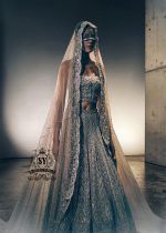 A luxurious bridal look, created by designers to fulfill your dream of a magnificent, fairytale-like bridal dress. Imagine yourself dancing in this bridal Lehenga Choli dress at the wedding hall, and you'll never want anything else. It's a stunning, super contemporary Lehenga design that definitely won't go unnoticed.