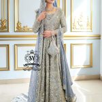 Discover Shazia Yasin’s Silver Chalice Bridal Dress with Blue Haze Lehenga, exquisitely embellished with silver zardozi and crystal embroidery. Perfect for engagement, Nikah or walima brides, this outfit captures royal tradition and luxury.