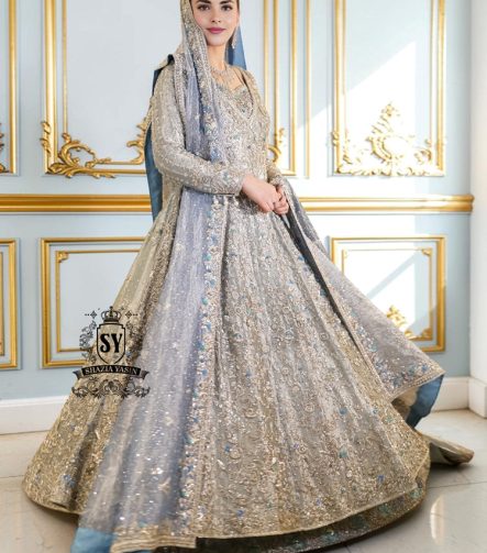Discover Shazia Yasin’s Silver Chalice Bridal Dress with Blue Haze Lehenga, exquisitely embellished with silver zardozi and crystal embroidery. Perfect for engagement, Nikah or walima brides, this outfit captures royal tradition and luxury.