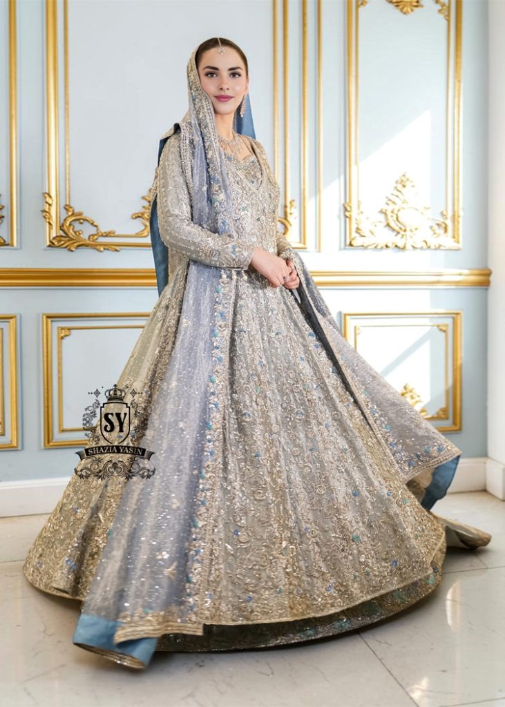 Discover Shazia Yasin’s Silver Chalice Bridal Dress with Blue Haze Lehenga, exquisitely embellished with silver zardozi and crystal embroidery. Perfect for engagement, Nikah or walima brides, this outfit captures royal tradition and luxury.