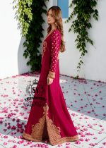 Truly stunning. This Big dip o’ruby raw silk Kaftan is perfect for evening occasions. Delicate Marori embroidery by skilled artisans adorns the sleeves and hem, creating a classic feel. For any celebration this season.