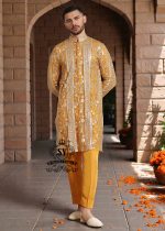 A luxurious mustard-gold kurta adorned with delicate floral and geometric embroidery — created for the man who believes in elegance, heritage, and refined festive style.