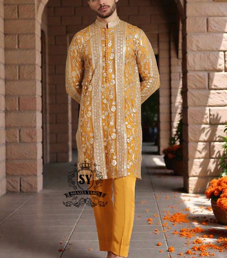 A luxurious mustard-gold kurta adorned with delicate floral and geometric embroidery — created for the man who believes in elegance, heritage, and refined festive style.