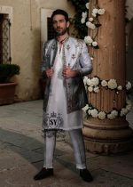 A refined wedding Prince suit with a bold personality. The Luxury lines, and mandarin collar lend a unique and sophisticated elegance, perfect for those who want to stand out in style on their most important day.