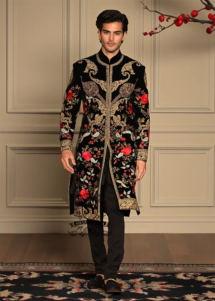 Sherwani194a A Velvet sherwani crafted with refined detailing and florals elegance designed for the groom who lets craftsmanship speak louder than trends.