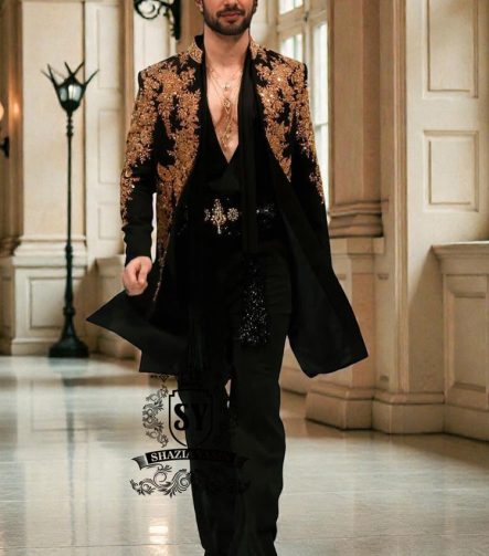 The intricate golden hand embroidery adds a touch of luxury and sophistication, making this a true Sherwani that will last a lifetime. Effortlessly sleek, perfectly tailored velvet Sherwani in Kokushoku Black— men’s cocktail fits designed for evenings that matter.