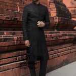 Discover the magic of black in our new sherwani suit—the perfect blend of understated elegance and touch of sophistication. Black doesn't just slim and add luxury: it creates an aura of mystery that draws eyes and sets hearts racing.