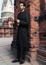 Discover the magic of black in our new sherwani suit—the perfect blend of understated elegance and touch of sophistication. Black doesn't just slim and add luxury: it creates an aura of mystery that draws eyes and sets hearts racing.
