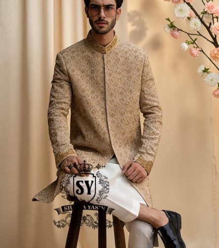 The signature elegance of the modern groom. A Sherwani suit that combines style, tradition, and premium tailoring. This elegant Bright Wood Sherwani dress blends timeless elegance with exquisite artistry, featuring beautiful embroidery that speaks of tradition and modern luxury.
