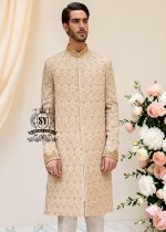 The signature elegance of the modern groom. A Sherwani suit that combines style, tradition, and premium tailoring. This elegant Bright Wood Sherwani dress blends timeless elegance with exquisite artistry, featuring beautiful embroidery that speaks of tradition and modern luxury.