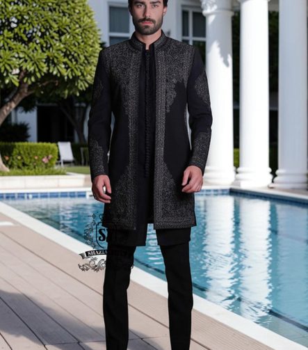 This front-open Sherwani suit boldly expresses a modern style, designed for the man who wants to exude presence without excessive ornamentation. Crafted from high-quality jet-black Korean suit fabric, the exquisite hand embroidery.