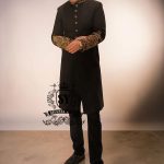 Draped in royalty. Tailored for the spotlight. Black Sherwani elegance elevated with intricate hand embroidery and timeless detailing.