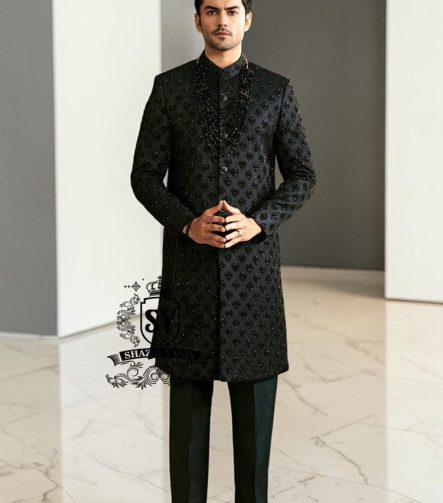 Black Embroidered Sherwani dignified and sophisticated design, this sherwani in deep black exudes power and elegance. Crafted from premium fabric, intricate embroidery that adds a touch of regal artistry without overpowering its sleek silhouette. The refined tailoring make it an ideal choice for grooms, formal receptions, and grand celebrations.